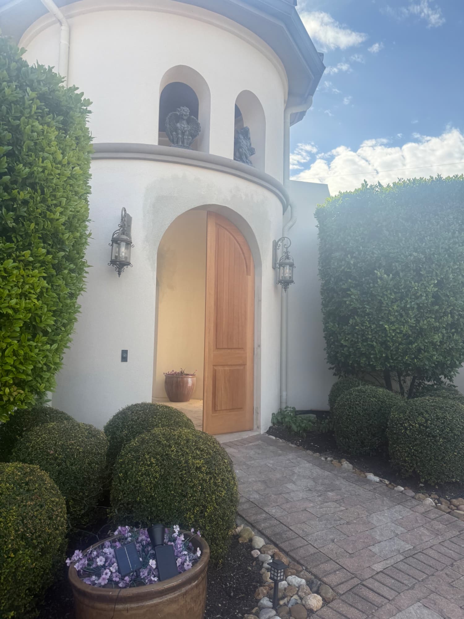 Before: Before and after luxury stucco estate exterior painting – Austin TX